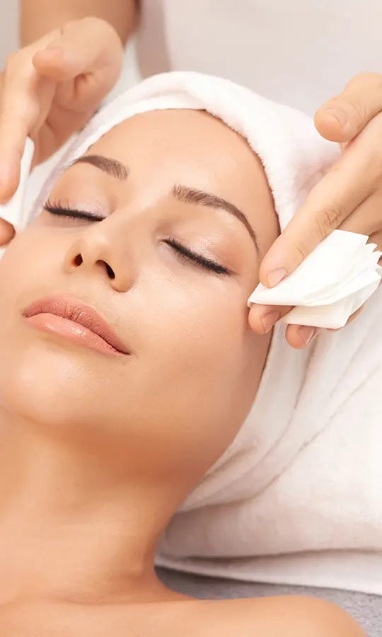 a woman with a towel on her head